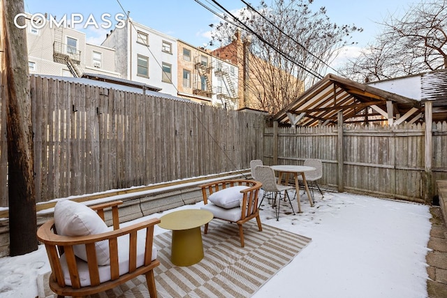 view of snow covered patio