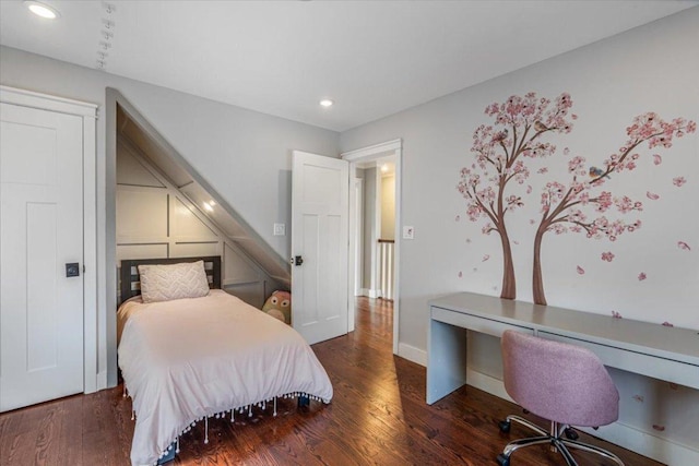 bedroom featuring dark wood-type flooring