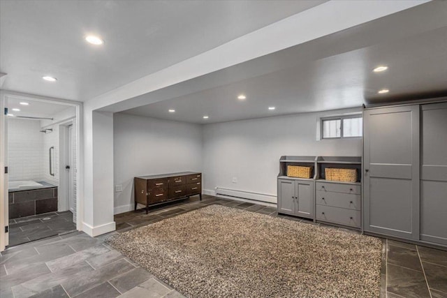 basement with a baseboard heating unit