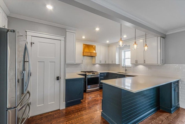 kitchen featuring white cabinetry, a breakfast bar area, custom exhaust hood, hanging light fixtures, and stainless steel appliances