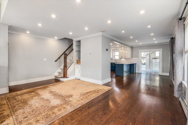 unfurnished living room featuring crown molding and dark hardwood / wood-style floors