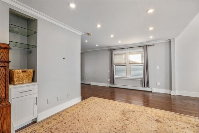 interior space featuring a baseboard radiator, ornamental molding, and dark hardwood / wood-style flooring