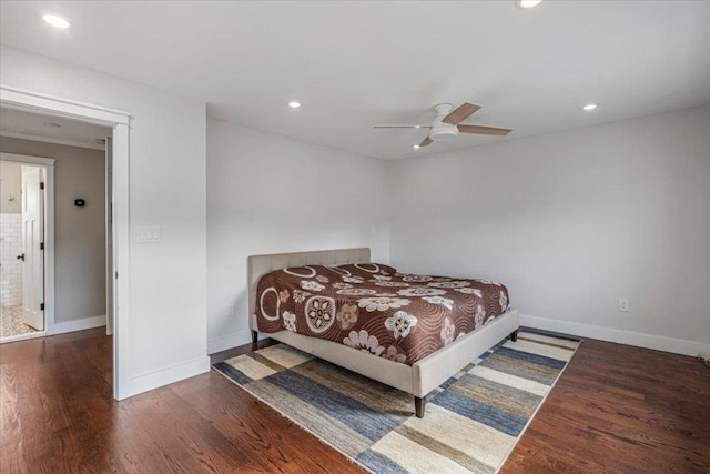 bedroom with ceiling fan and dark hardwood / wood-style floors