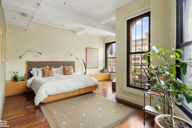 bedroom featuring dark hardwood / wood-style floors