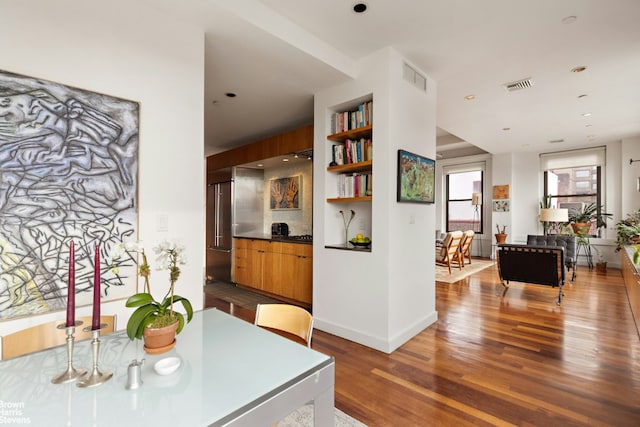 dining area featuring dark hardwood / wood-style floors