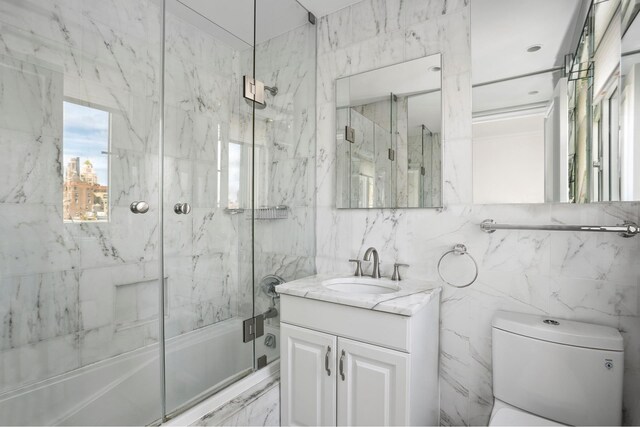 kitchen featuring tasteful backsplash, stainless steel appliances, and white cabinets