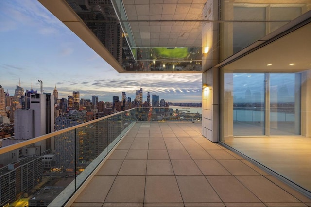 balcony at dusk with a water view