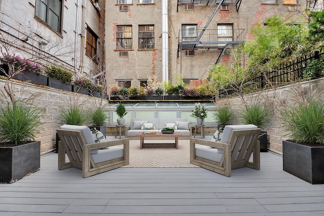 459 W 18th St Unit 1, New York City, NY 10011 - view of patio with a wooden deck and an outdoor hangout area