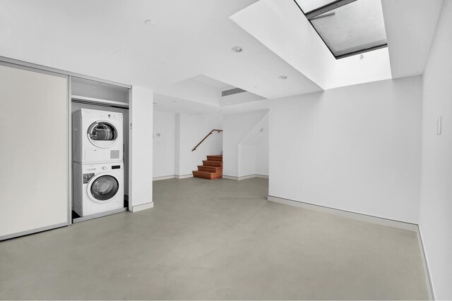 459 W 18th St Unit 1, New York City, NY 10011 - finished basement featuring estacked washer and dryer and stairway