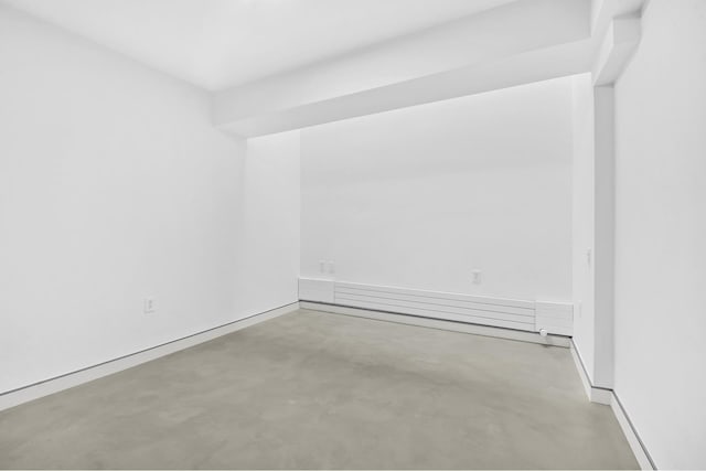 459 W 18th St Unit 1, New York City, NY 10011 - spare room featuring concrete floors and baseboards