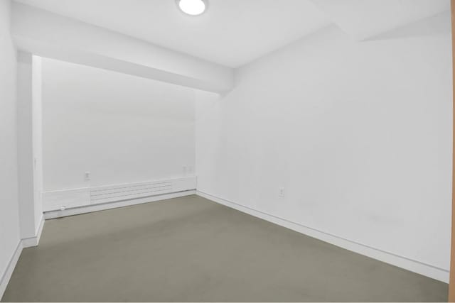 spare room featuring concrete floors