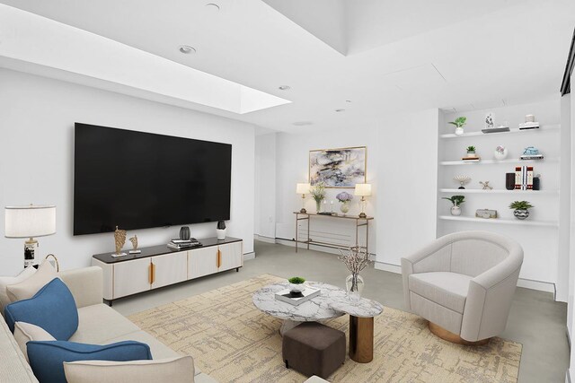 459 W 18th St Unit 1, New York City, NY 10011 - living area with a skylight, concrete flooring, and built in shelves