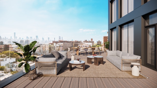 31-16 21st St Unit 2-B, New York City, NY 11106 - wooden terrace featuring a view of skyline and an outdoor hangout area