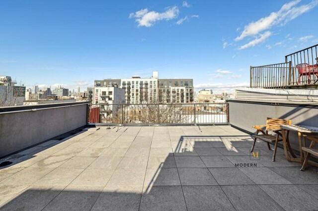 view of patio with a view of city