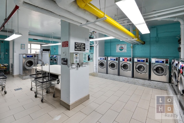 common laundry area with washing machine and clothes dryer