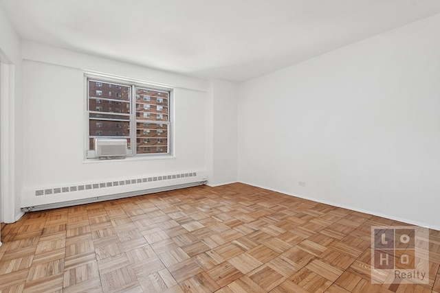 empty room featuring cooling unit and a baseboard radiator