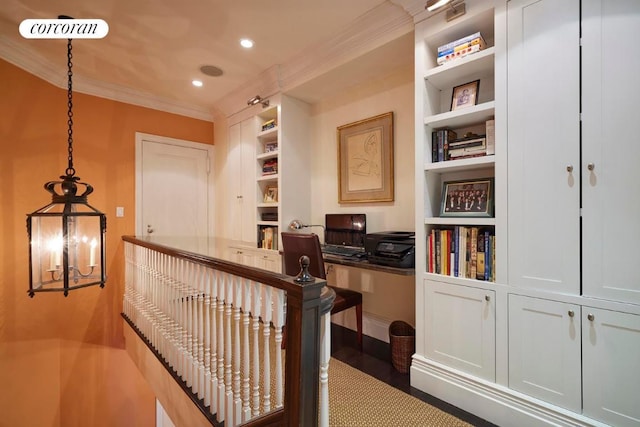 interior space featuring ornamental molding, dark hardwood / wood-style floors, and built in features