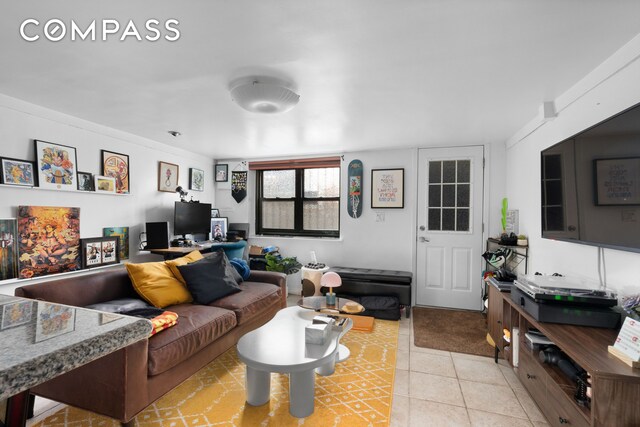 living room featuring light tile patterned floors