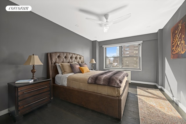 bedroom featuring a ceiling fan, visible vents, baseboards, and dark wood-type flooring