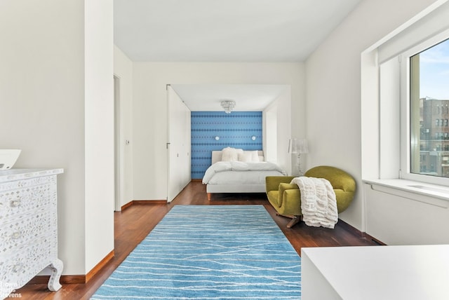 bedroom featuring dark hardwood / wood-style flooring