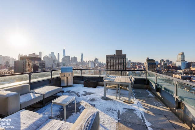 view of patio / terrace featuring a city view and a balcony