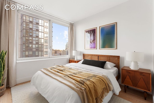 bedroom featuring light hardwood / wood-style floors