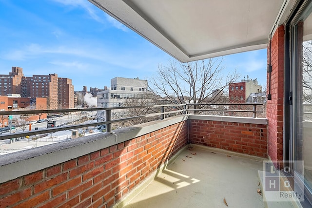 balcony featuring a view of city