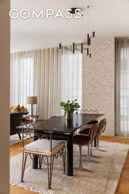 dining area with hardwood / wood-style flooring