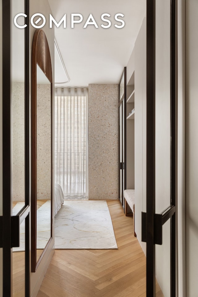 hallway featuring wood finished floors