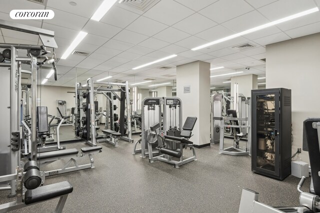425 Main St Unit 16B, New York City, NY 10044 - gym with visible vents and a drop ceiling