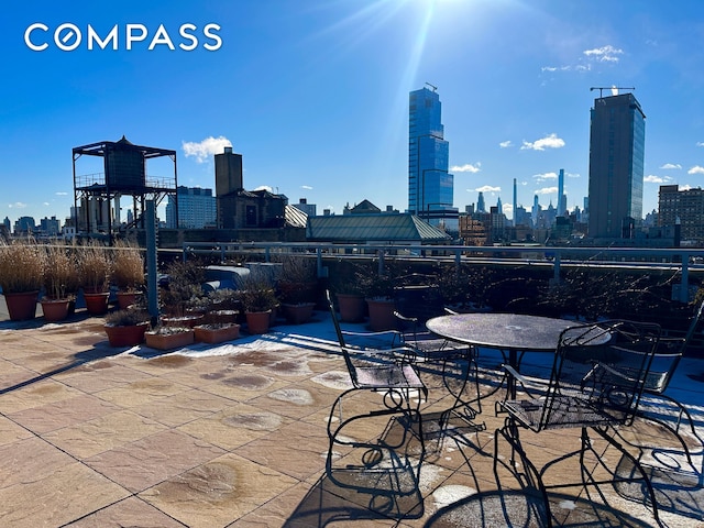 view of patio with a city view