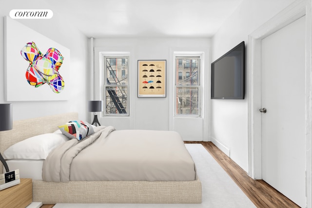 bedroom featuring hardwood / wood-style flooring