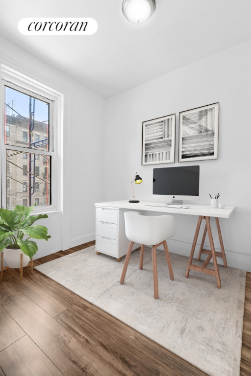 office area with hardwood / wood-style floors