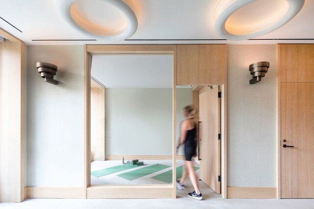 bathroom featuring vanity and plus walk in shower