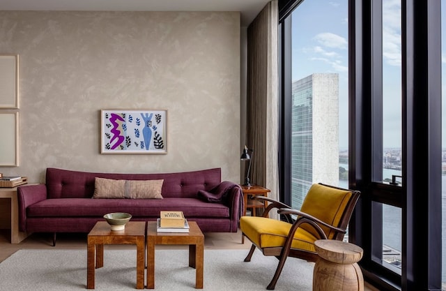 living room with floor to ceiling windows