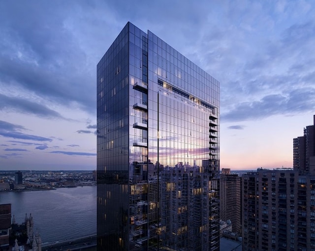 outdoor building at dusk with a water view