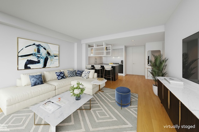 350 W 42nd St Unit 53F, New York City, NY 10036 - living room featuring light wood finished floors and wet bar
