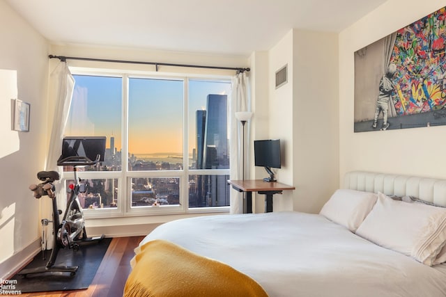 350 W 42nd St Unit 53F, New York City, NY 10036 - bedroom with wood finished floors