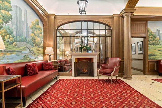 living area with ornate columns