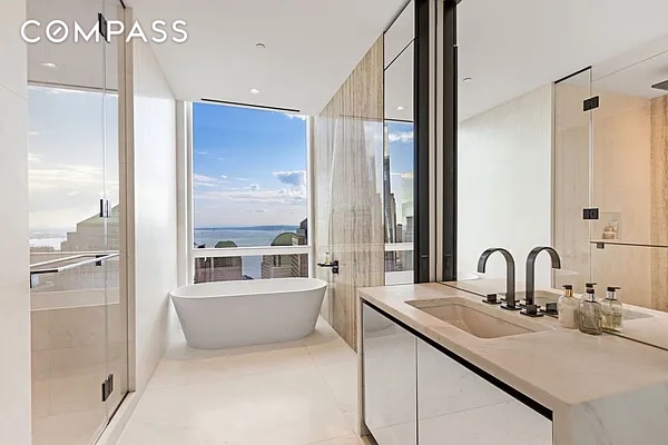 full bathroom with floor to ceiling windows, vanity, a soaking tub, tile patterned floors, and a stall shower