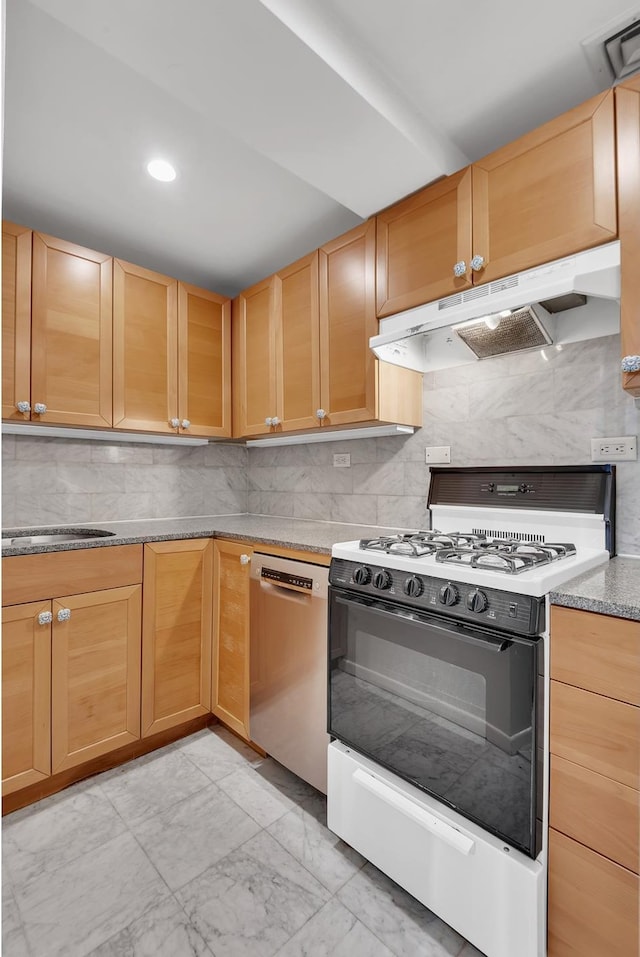 kitchen featuring under cabinet range hood, marble finish floor, stainless steel dishwasher, tasteful backsplash, and gas range oven