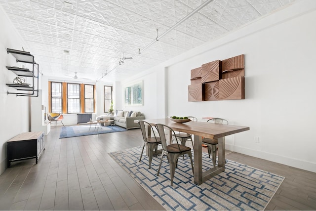 131 W 28th St Unit 3A, New York City, NY 10001 - dining space featuring an ornate ceiling, wood finished floors, and ceiling fan