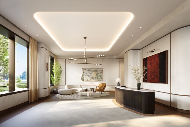 dining area featuring a wall of windows and a tray ceiling