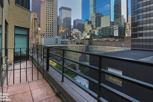 balcony featuring a view of city