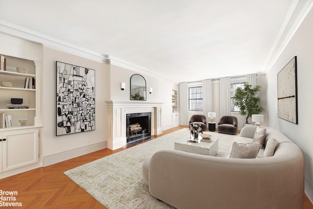 485 Park Ave Unit 4B, New York City, NY 10022 - living area with ornamental molding, a premium fireplace, and built in shelves