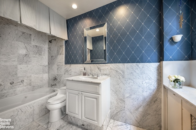 full bathroom featuring toilet, vanity, shower / bathtub combination, marble finish floor, and tile walls