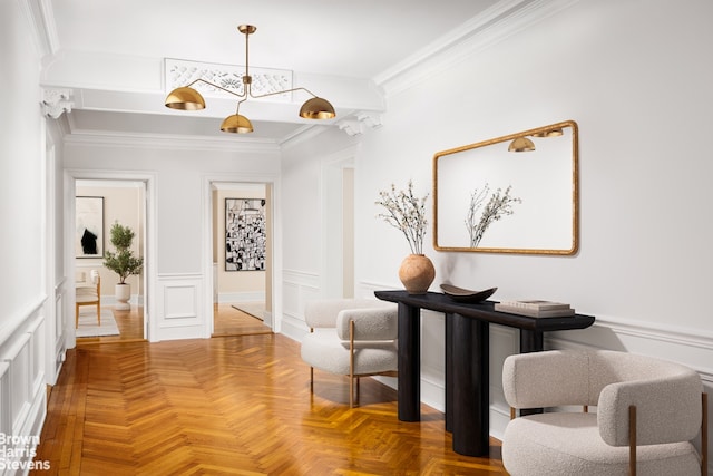 485 Park Ave Unit 4B, New York City, NY 10022 - hallway featuring ornamental molding, a decorative wall, and wainscoting