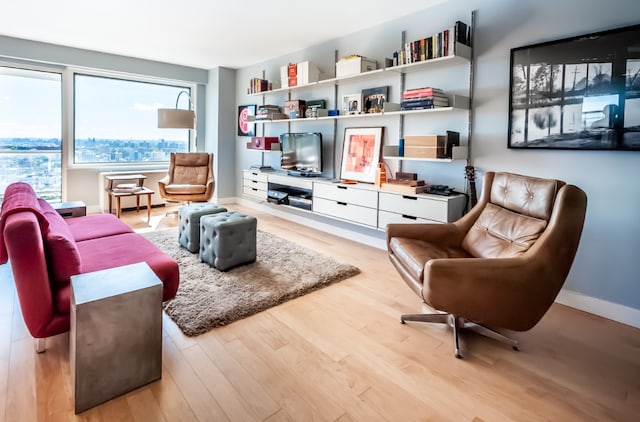 living area with light hardwood / wood-style floors