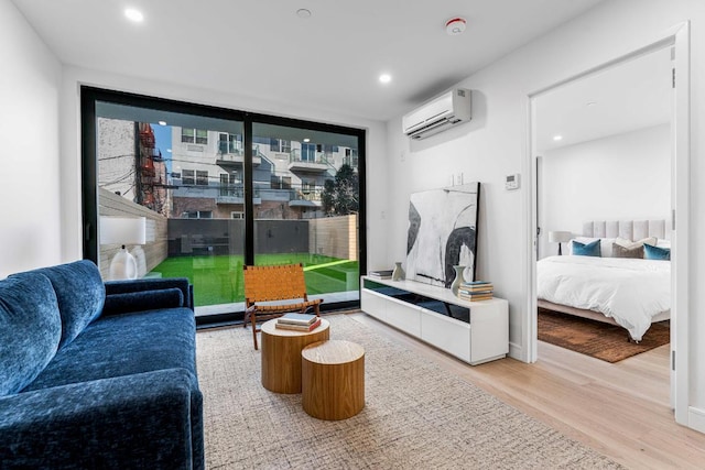 interior space featuring wood-type flooring and a wall unit AC