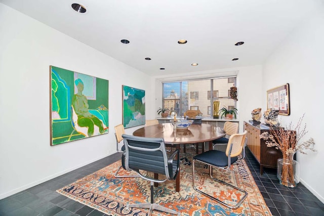 dining area with recessed lighting and baseboards